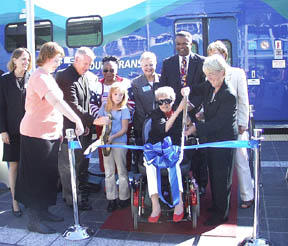 Event attendees - including U.S. Sen. Patty Murray at the far right in the front row - cut the ribbon at Fridays dedication of Sound Transits Tacoma Dome Station at Freighthouse Square. (Photo by Brett Davis)