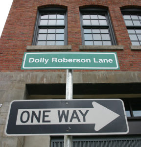 A street sign designates a section of Commerce Street north of 21st Street on the UWT campus as Dolly Roberson Lane. (PHOTO BY TODD MATTHEWS)