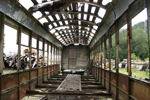 A late-morning gray light creeps through the arched and pockmarked roof of an old Turtleback streetcar that once operated in Tacoma. Today, it sits on a 40-acre field in Rockport, Wash., and is owned by Historic Railway Restoration. (PHOTO BY TODD MATTHEWS)