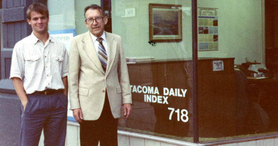 Tacoma native Marshall B. Skidmore, with his son Rob, in October of 1989, outside the Tacoma Daily Index's office on Pacific Avenue in downtown Tacoma.  Skidmore, who owned the city's legal newspaper for 37 years, passed away on July 23. (PHOTO COURTESY SKIDMORE FAMILY)