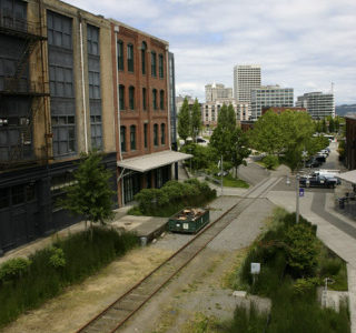 The former Prairie Line cuts through the University of Washington Tacoma campus toward downtown and the waterfront. It could be converted into a trail for bikes and pedestrians traveling between South Tacoma and the city's central business district, according to a development deal presently being considered by the City of Tacoma and Burlington Northern Santa Fe Railway. (PHOTO BY TODD MATTHEWS)