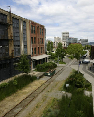 The former Prairie Line cuts through the University of Washington Tacoma campus toward downtown and the waterfront. It could be converted into a trail for bikes and pedestrians traveling between South Tacoma and the city's central business district, according to a development deal presently being considered by the City of Tacoma and Burlington Northern Santa Fe Railway. (PHOTO BY TODD MATTHEWS)