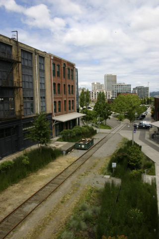 The former Prairie Line cuts through the University of Washington Tacoma campus toward downtown and the waterfront. It could be converted into a trail for bikes and pedestrians traveling between South Tacoma and the city's central business district, according to a development deal presently being considered by the City of Tacoma and Burlington Northern Santa Fe Railway. (PHOTO BY TODD MATTHEWS)