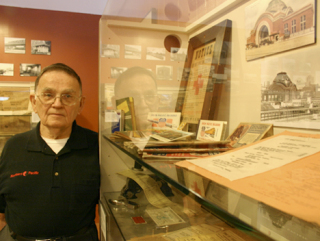 "The nice thing about a [passenger] train is you can see what the country looks like -- you can look right out into people's backyards," says historian, author, and retired railroad employee Jim Fredrickson, who has amassed a collection of passenger train memorabilia. (PHOTO BY TODD MATTHEWS)