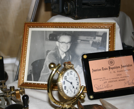 Among the items on display are Fredrickson's timepiece, lifetime certificate from the American Train Dispatchers Association, and a photograph of Fredrickson at work as a telegraph operator. (PHOTO BY TODD MATTHEWS)