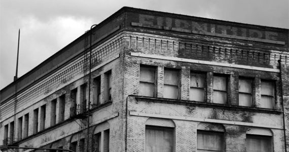 Abandoned for more than two decades, the six-story Luzon Building has seen better days. Downtown Tacoma-based Gintz Group hopes the building's natural light and large floor plans will appeal to tenants once a $7.5 million renovation is complete. (PHOTO BY TODD MATTHEWS)