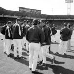 Players warm up last spring, days away from the beginning of the season. (PHOTO BY TODD MATTHEWS)