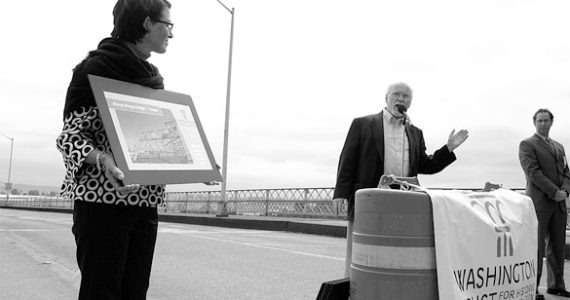 In 2008, Jennifer Meisner and Chris Moore of the Washington Trust for Historic Preservation chose Tacoma to hold its press conference to announce its annual list of Washington State's most endangered historic properties. The pair, along with State Rep. Dennis Flannigan (D-Tacoma), made the announcement on the Murray Morgan Bridge deck. (FILE PHOTO BY TODD MATTHEWS)