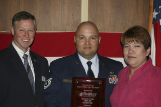 Technical Sergeant  Juan Colon (center) is this year's Howard O. Scott Citizen-Soldier Award recipient. TSgt. Colon is joined by his wife, Francis, and George Cargill of TriWest Healthcare Alliance. (PHOTO COURTESY TACOMA-PIERCE COUNTY CHAMBER)