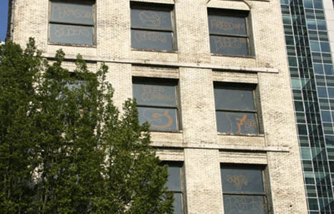 Taggers hit the 119-year-old Luzon Building in downtown Tacoma this week. (PHOTO BY TODD MATTHEWS)