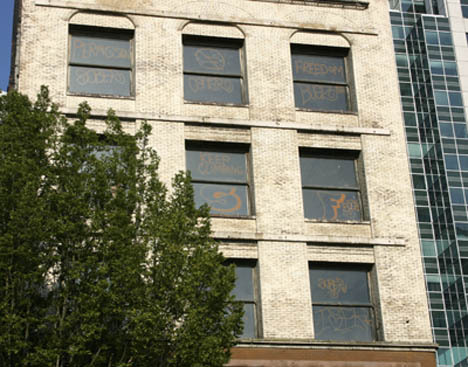 Taggers hit the 119-year-old Luzon Building in downtown Tacoma this week. (PHOTO BY TODD MATTHEWS)