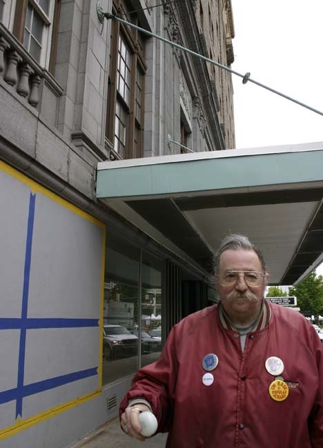 "I gave up smoking a few years ago," says Winthrop resident John Heffler. Better known as 'Yo-Yo Man,' Heffler, 52, has lived in the downtown high-rise for a decade. "I took up the yo-yo and gave up smoking. It really helps." (PHOTO BY TODD MATTHEWS)