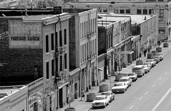 A historic photograph of the buildings that lined the area near the Luzon Building in downtown Tacoma. (COLUMBIA CORNERSTONE DEVELOPMENT COMPANY PHOTO COLLECTION 2008-7, COURTESY OF WEYERHAEUSER ARCHIVES)