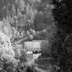 Electron and its namesake hydroelectric dam, the first such dam in Pierce County. The settlement was created in 1903. A portion of the Puyallup River  was rerouted through a narrow gorge in order to power Tacoma's homes and streetcars. (PHOTO BY TODD MATTHEWS)