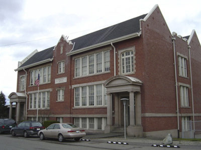 Oakland Alternative High School in Tacoma's South End was built in 1912 by architects Frederick Heath and George Gove. It is one of more than two-dozen pre-1960s school buildings owned by Tacoma Public Schools that could be eligible for the City of Tacoma's register of historic places. (PHOTO COURTESY SHARON WINTERS / HISTORIC TACOMA)