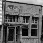 In the 1930s, the bank building, located at 766 Main Street, underwent a renovation of its facade, replacing columns and a portico with an Art Deco design. (PHOTO BY TODD MATTHEWS)