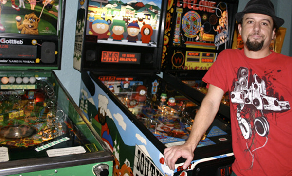 "I want people to come in here and act like kids," says Les Voros-Bond of Dorky's Arcade. "I want people to have fun and not be too serious. I've seen people just get big smiles on their faces when they see the games and they just lose it." (PHOTO BY TODD MATTHEWS)