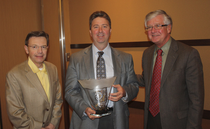 Steve Thomason (left) and Tom Taylor (right) of Taylor-Thomason Insurance presented the Tahoma Business Environmental Award to Eddie Westmoreland, Western Region VP of Government Affairs at Waste Connections. (PHOTO COURTESY TACOMA-PIERCE COUNTY CHAMBER)