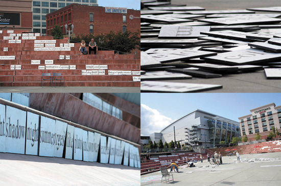 "Words," a new temporary installation by Tacoma artist James Grayson Sinding, opened in Tollefson Plaza Saturday afternoon. Sinding dumped hundreds of hand-painted wooden words, refrigerator-magnet-style, onto the plaza out of the back of a shiny dump truck. (PHOTOS COURTESY KEVIN FREITAS / FEEDTACOMA.COM)