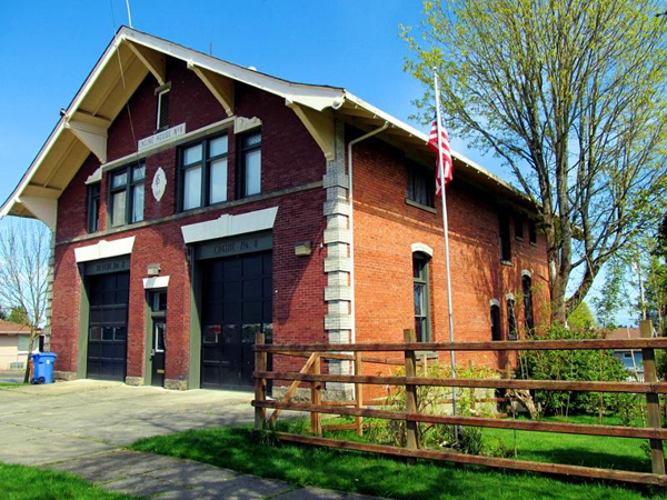 Supporters of live/work spaces in Tacoma point to this century-old firehouse-turned-live/work space in the Whitman neighborhood. Listed on Tacoma's Register of Historic Places, Tacoma Firehouse No. 8 was built in 1909 and served as a fire station until decommissioned in 2003. Two years later, the building, located at 4301 South L Street, was remodeled to provide warehouse space for "With Love Chocolates" and living space for the company's owners on the second floor.