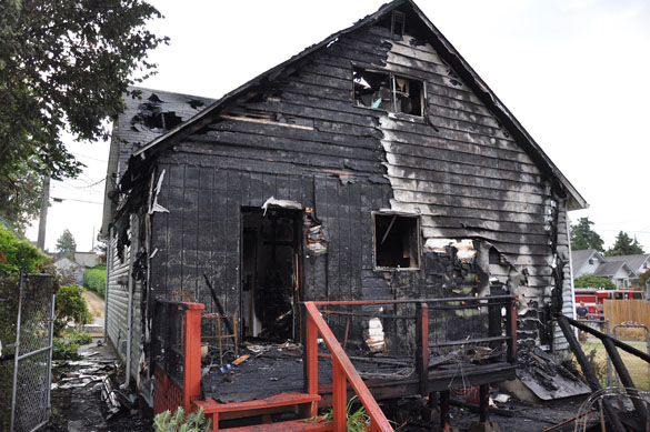 Tacoma fire fighters responded early Wednesday morning to a house fire in the 1200 block of South Adams Street. (PHOTO COURTESY TACOMA FIRE DEPARTMENT)