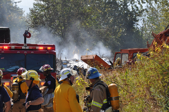 Tacoma fire fighters responded mid-day Thursday to a brush fire in the Northeast Tacoma and Fife Heights area. (PHOTO COURTESY TACOMA FIRE DEPARTMENT)