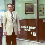 Tacoma native Marshall B. Skidmore, with his son Robert, in October of 1989, outside the Tacoma Daily Index's office on Pacific Avenue in downtown Tacoma.  Skidmore, who owned the city's legal newspaper for 37 years, passed away on July 23, 2007. (PHOTO COURTESY SKIDMORE FAMILY)
