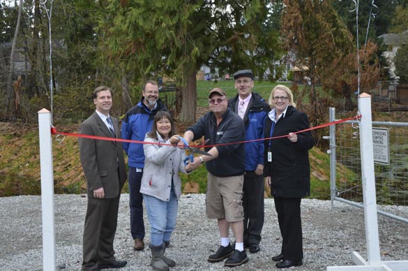 Pierce County Executive Pat McCarthy (far right) joined Public Works staff and neighbors during a ribbon-cutting ceremony Wednesday afternoon. (PHOTO COURTESY PIERCE COUNTY)