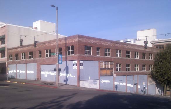 A vacant building in the heart of downtown Tacoma before an artistic mural was created to promote the city center. (PHOTO COURTESY DOWNTOWN ON THE GO)