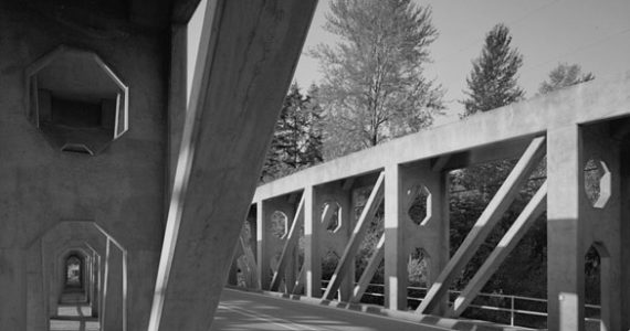 The McMillin Bridge's concrete trusses are monumental in scale and allow pedestrians to walk through them. "There's almost a cathedral-like experience when you walk through those trusses," says Chis Moore of the Washington Trust for Historic Preservation. "There is an architectural element to the McMillin Bridge that is missing in other bridges. It doesn't have the ‘Erector Set' look that steel bridges have. It has this cloistered effect when you walk under those sculptured trusses." (PHOTOS COURTESY HISTORIC AMERICAN ENGINEERING RECORD / NATIONAL PARK SERVICE)