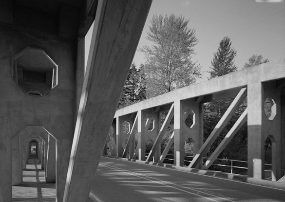 The McMillin Bridge's concrete trusses are monumental in scale and allow pedestrians to walk through them. "There's almost a cathedral-like experience when you walk through those trusses," says Chis Moore of the Washington Trust for Historic Preservation. "There is an architectural element to the McMillin Bridge that is missing in other bridges. It doesn't have the ‘Erector Set' look that steel bridges have. It has this cloistered effect when you walk under those sculptured trusses." (PHOTOS COURTESY HISTORIC AMERICAN ENGINEERING RECORD / NATIONAL PARK SERVICE)