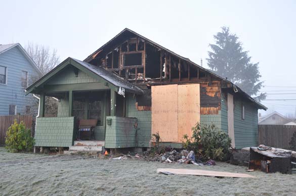 Tacoma fire fighters responded to a house fire at approximately 10:20 p.m. Tuesday night. Fire crews arrived at the scene to find heavy flames and smoke pouring out of the front of the 1.5-story, 936-square-foot single-family residence located in the 4500 block of South Fawcett Avenue. (PHOTO COURTESY TACOMA FIRE DEPARTMENT)