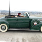 Tacoma Mayor Marilyn Strickland crosses the Murray Morgan Bridge Friday morning in a classic automobile. (PHOTO COURTESY CITY OF TACOMA)