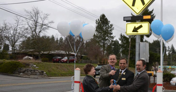 Pierce County officials celebrated the completion of a new crosswalk in Key Center with a ribbon cutting ceremony Wednesday morning. (PHOTO COURTESY PIERCE COUNTY)
