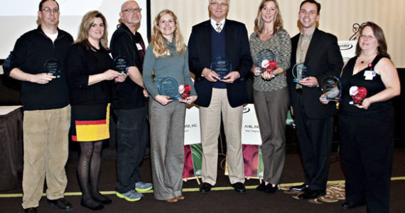 This year's recipients of the Tacoma-Pierce County Chamber's "WorkWell Awards" included (from let to right) Chris Watson, MacMillan Piper, Inc.; Dan Fitch & Kristine Grant, Tacoma Lutheran Retirement Community; Taryn West, MultiCare Health System; Paul Opgrande, Tacoma Lutheran Retirement Community; Lisa Croft, Port of Tacoma; Tim Hansen, AHBL, Inc.; and Leann Maass, Nisqually Red Wind Casino. The awards recognize local employers who make health and wellness a priority in their work places. (PHOTO COURTESY TACOMA-PIERCE COUNTY CHAMBER)