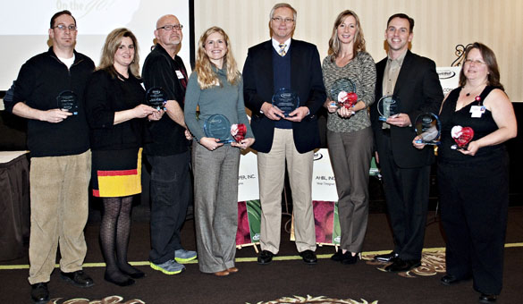 This year's recipients of the Tacoma-Pierce County Chamber's "WorkWell Awards" included (from let to right) Chris Watson, MacMillan Piper, Inc.; Dan Fitch & Kristine Grant, Tacoma Lutheran Retirement Community; Taryn West, MultiCare Health System; Paul Opgrande, Tacoma Lutheran Retirement Community; Lisa Croft, Port of Tacoma; Tim Hansen, AHBL, Inc.; and Leann Maass, Nisqually Red Wind Casino. The awards recognize local employers who make health and wellness a priority in their work places. (PHOTO COURTESY TACOMA-PIERCE COUNTY CHAMBER)