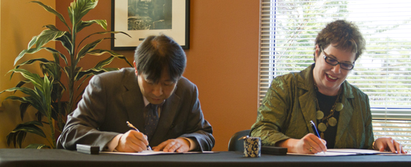 University of Kitakyushu Vice President Kenichi Kihara signed a memorandum of understanding with Tacoma Community College President Dr. Pamela Transue Wednesday that allows Tacoma students to study in Japan. (PHOTO COURTESY TACOMA COMMUNITY COLLEGE)