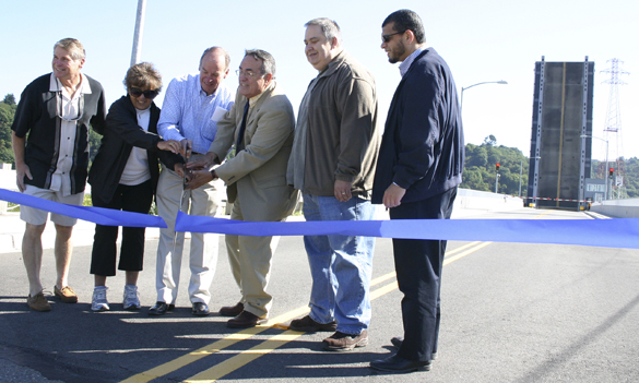 Last June, representatives from the City of Tacoma and the Port of Tacoma gathered on the west side of the Blair Waterway for a ribbon-cutting ceremony to celebrate the official re-opening of the Hylebos Bridge. (FILE PHOTO BY TODD MATTHEWS)