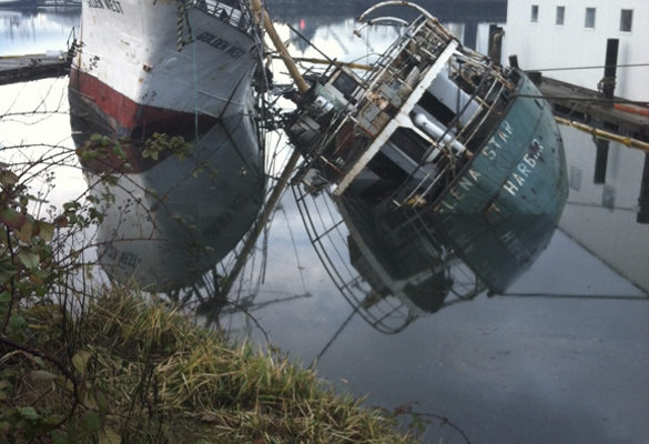 In January, the Helena Star sank in the Hylebos Waterway, dragging the 130-foot fishing vessel Golden West over to an extreme angle. (PHOTO COURTESY WASHINGTON STATE DEPARTMENT OF ECOLOGY)