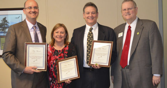 A team of Pierce County employees who redesigned part of the county's Web site to make it much easier for citizens to access public records were honored Wednesday by the Washington Coalition for Open Government (WCOG). WCOG President Toby Nixon (far right) presented the organization's Key Award to county communications director Hunter George, the project sponsor, Diane Ladenburg, public records ombudsman, and Al Rose, justice services director. (PHOTO COURTESY PIERCE COUNTY)