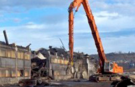 Building #65 at the former Kaiser Aluminum Smelter site was recently demolished as part of a project at the Port of Tacoma aimed to redevelop the 96-acre site. Port officials said this week that they were able to recycle more than 150 million pounds of steel, copper, aluminum, lead, concrete, alumina ore, oil and carbon anodes. (PHOTO BY CHRIS MILEWSKI / COURTESY PORT OF TACOMA, SHAW ENVIORNMENTAL)