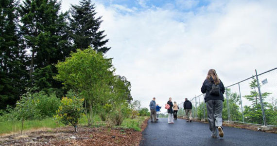 Visitors walked along a recently opened segment of the Pipeline Trail in Tacoma's Salishan neighborhood. (PHOTO COURTESY CITY OF TACOMA)