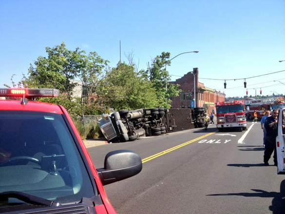 Semi truck overturns in downtown Tacoma