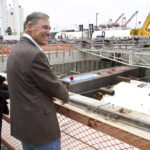 Gov. Jay Inslee and former Gov. Chris Gregoire prepare for a bottle-breaking ceremony Saturday in downtown Seattle to mark the State Route 99 tunneling machine's (nicknamed "Bertha") approaching departure beneath the city. The event drew more than 5,000 people. (PHOTO COURTESY WSDOT)