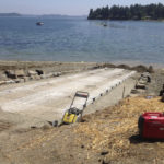 Pierce County Public Works crews are nearly finished rehabilitating the A Street KPS boat launch in the community of Home near Carr Inlet. The boat launch was closed on July 15 to allow crews to replace the existing ramp structure with concrete panels purchased from the Washington Department of Fish and Wildlife. According to Pierce County officials, work should be completed this week, with the exception of some paving. (PHOTO COURTESY PIERCE COUNTY)