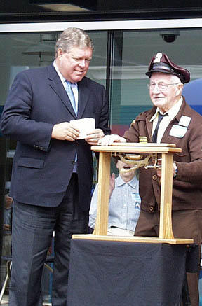 AUGUST 23, 2003 | U.S. Rep. Norm Dicks (D-Wash) joins Cliff Fournier, 86, of Tenino, Wash., the last living trolley operator from the Tacoma Railway and Power Co., as he rings the bell that officially launches Tacoma Link light rail. (TACOMA DAILY INDEX FILE PHOTO)