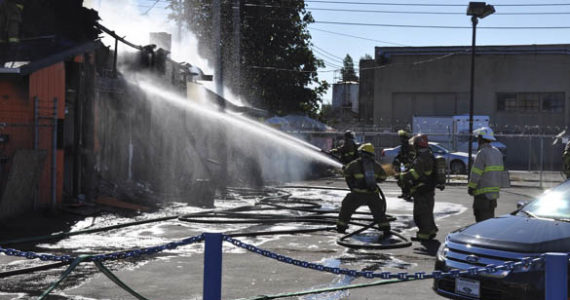 Tacoma fire fighters battle a blaze at a tavern on South Tacoma Way on Aug. 20. (PHOTO COURTESY TACOMA FIRE DEPARTMENT)