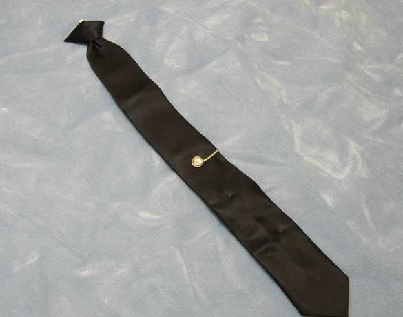 The clip-on tie and tie-tack worn by hijacker Dan "D.B." Cooper on Nov. 24, 1971. (PHOTO COURTESY WASHINGTON STATE HISTORICAL SOCIETY)
