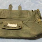 Green, chest-mount reserve container provided to hijacker Dan "D.B." Cooper on Nov. 24, 1971. Part of one of four parachutes provided to the hijacker as part of his demands. (PHOTO COURTESY WASHINGTON STATE HISTORICAL SOCIETY)