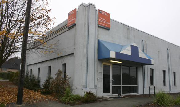 Chuckals Office Products in downtown Tacoma is considering a move to a former Police Station (pictured) in the McKinley Hill Business District. (PHOTO BY TODD MATTHEWS)